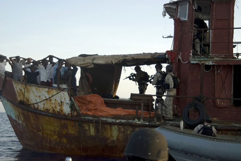 Coast Guard LEDET seizing suspected pirates. (U.S. Coast Guard) Coast Guard LEDET seizing suspected pirates. (U.S. Coast Guard)